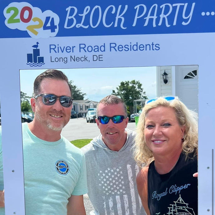 Social media post with three people posing outdoors, featuring a '2024 Block Party' banner.